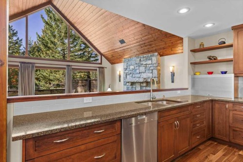 16 Blue Grouse Ridge, Canmore, AB - Indoor Photo Showing Kitchen With Double Sink