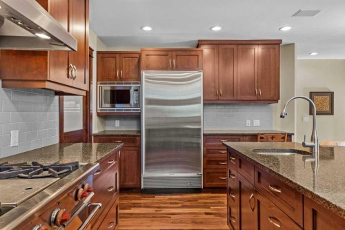 16 Blue Grouse Ridge, Canmore, AB - Indoor Photo Showing Kitchen With Upgraded Kitchen