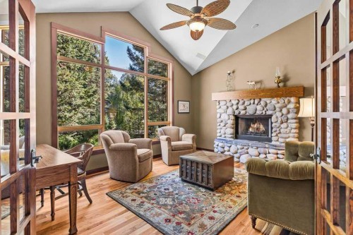 16 Blue Grouse Ridge, Canmore, AB - Indoor Photo Showing Living Room With Fireplace