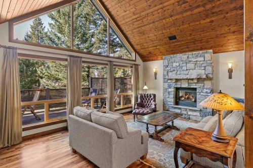 16 Blue Grouse Ridge, Canmore, AB - Indoor Photo Showing Living Room With Fireplace
