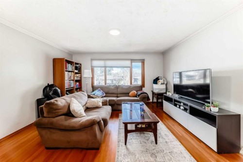 1415 Rosehill Drive Nw, Calgary, AB - Indoor Photo Showing Living Room