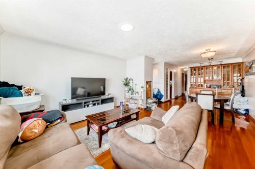 1415 Rosehill Drive Nw, Calgary, AB - Indoor Photo Showing Living Room