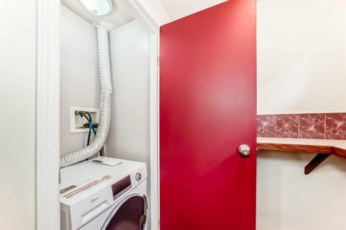 1415 Rosehill Drive Nw, Calgary, AB - Indoor Photo Showing Laundry Room