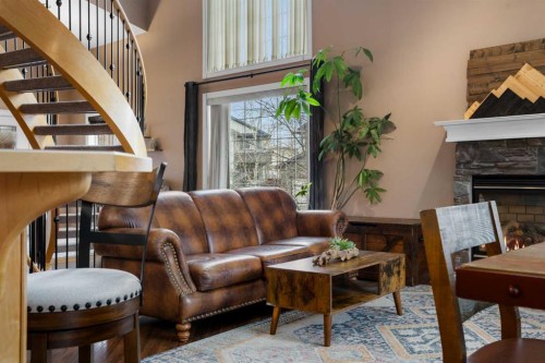 173 Cimarron Park Circle, Okotoks, AB - Indoor With Fireplace