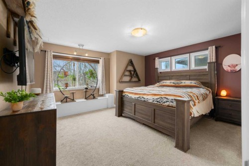 173 Cimarron Park Circle, Okotoks, AB - Indoor Photo Showing Bedroom