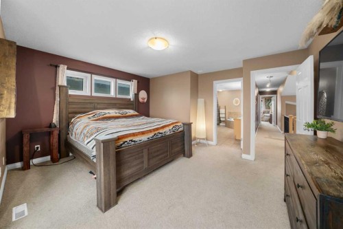 173 Cimarron Park Circle, Okotoks, AB - Indoor Photo Showing Bedroom