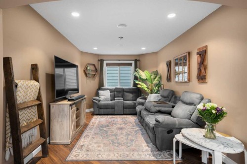 173 Cimarron Park Circle, Okotoks, AB - Indoor Photo Showing Living Room
