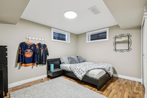 56 Haddock Road Sw, Calgary, AB - Indoor Photo Showing Bedroom