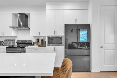 52 Edith Gate Nw, Calgary, AB - Indoor Photo Showing Kitchen