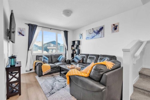 52 Edith Gate Nw, Calgary, AB - Indoor Photo Showing Living Room