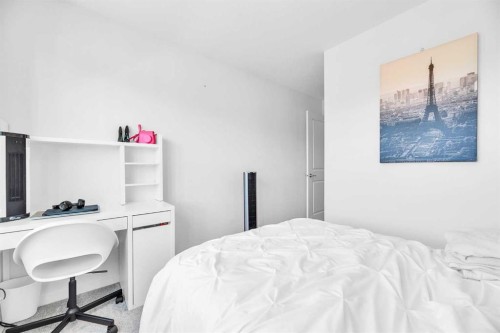 52 Edith Gate Nw, Calgary, AB - Indoor Photo Showing Bedroom