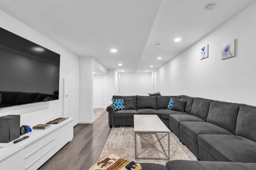52 Edith Gate Nw, Calgary, AB - Indoor Photo Showing Living Room
