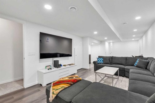 52 Edith Gate Nw, Calgary, AB - Indoor Photo Showing Living Room
