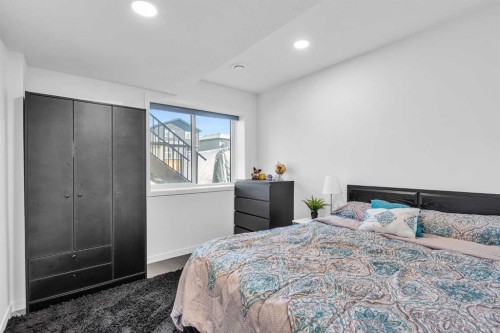 52 Edith Gate Nw, Calgary, AB - Indoor Photo Showing Bedroom