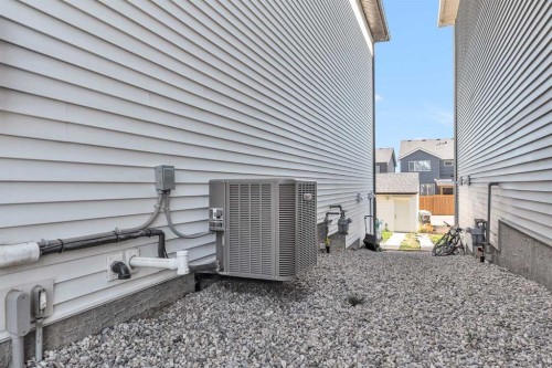 52 Edith Gate Nw, Calgary, AB - Outdoor With Exterior