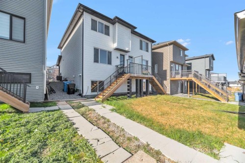 52 Edith Gate Nw, Calgary, AB - Outdoor With Deck Patio Veranda