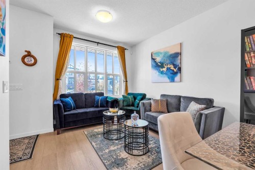 52 Edith Gate Nw, Calgary, AB - Indoor Photo Showing Living Room