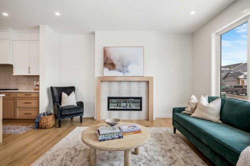 28 Sunvalley View, Cochrane, AB - Indoor Photo Showing Living Room With Fireplace