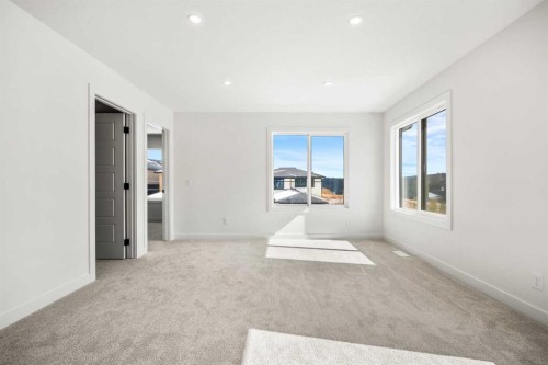 28 Sunvalley View, Cochrane, AB - Indoor Photo Showing Other Room
