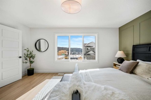 28 Sunvalley View, Cochrane, AB - Indoor Photo Showing Bedroom