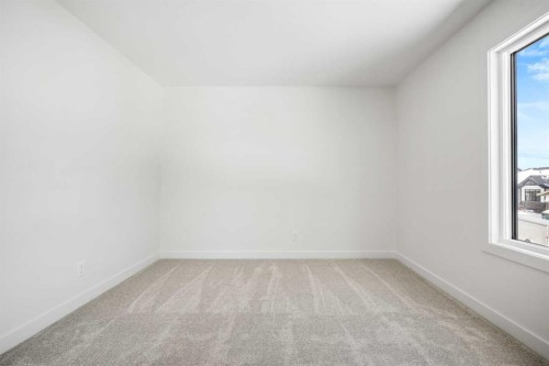 28 Sunvalley View, Cochrane, AB - Indoor Photo Showing Other Room