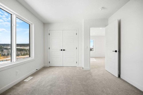 28 Sunvalley View, Cochrane, AB - Indoor Photo Showing Other Room