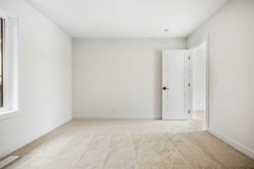 28 Sunvalley View, Cochrane, AB - Indoor Photo Showing Other Room