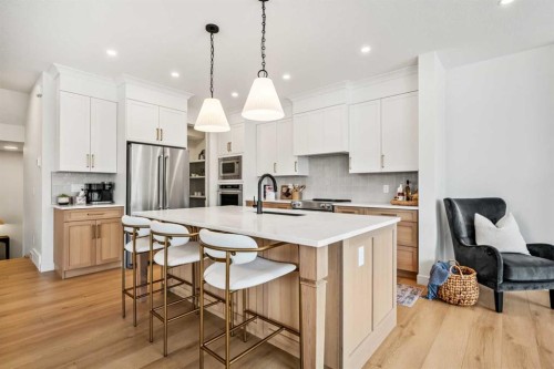 28 Sunvalley View, Cochrane, AB - Indoor Photo Showing Kitchen With Upgraded Kitchen