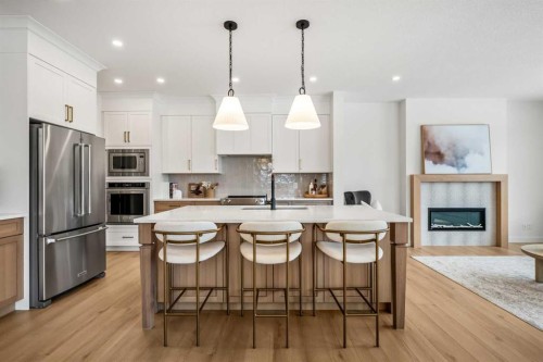 28 Sunvalley View, Cochrane, AB - Indoor Photo Showing Kitchen With Upgraded Kitchen