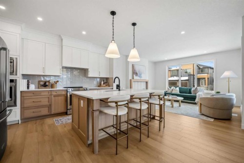 28 Sunvalley View, Cochrane, AB - Indoor Photo Showing Kitchen With Upgraded Kitchen