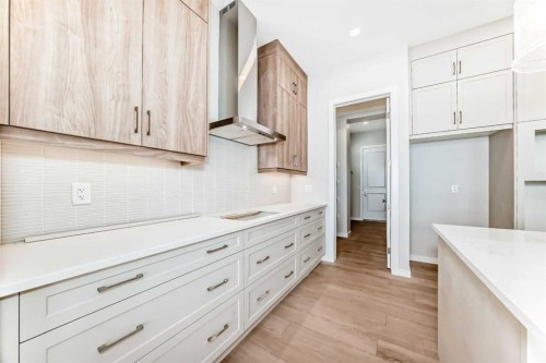 203 Langwell Common Se, Airdrie, AB - Indoor Photo Showing Kitchen