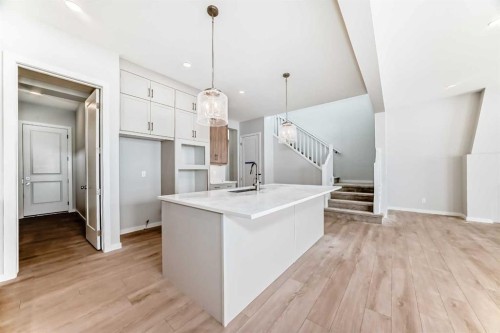 203 Langwell Common Se, Airdrie, AB - Indoor Photo Showing Kitchen