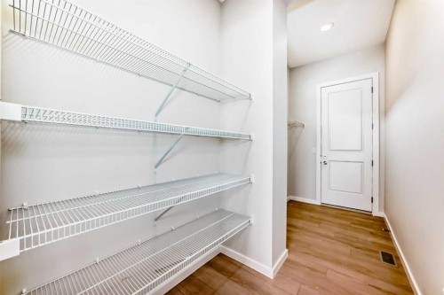 203 Langwell Common Se, Airdrie, AB - Indoor With Storage