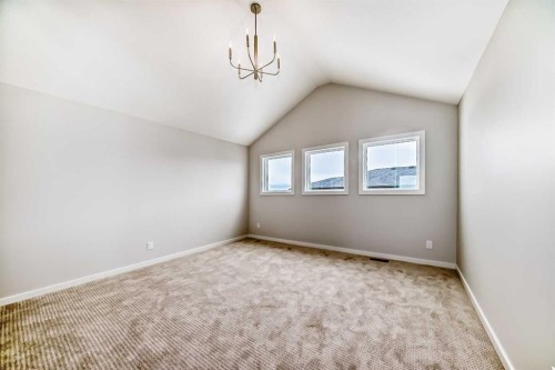 203 Langwell Common Se, Airdrie, AB - Indoor Photo Showing Other Room