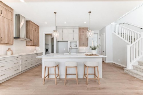203 Langwell Common Se, Airdrie, AB - Indoor Photo Showing Kitchen With Upgraded Kitchen