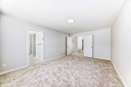 203 Langwell Common Se, Airdrie, AB - Indoor Photo Showing Other Room