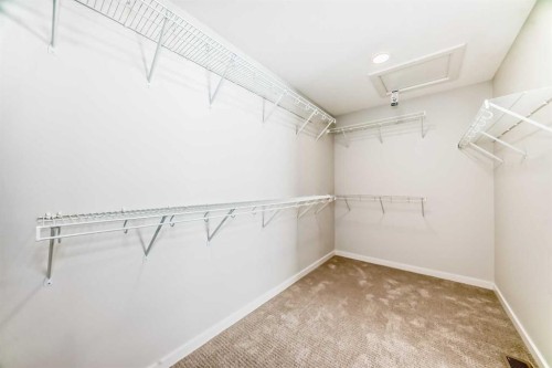 203 Langwell Common Se, Airdrie, AB - Indoor With Storage