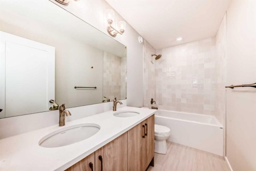 203 Langwell Common Se, Airdrie, AB - Indoor Photo Showing Bathroom