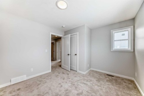 203 Langwell Common Se, Airdrie, AB - Indoor Photo Showing Other Room