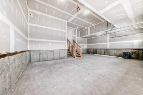203 Langwell Common Se, Airdrie, AB - Indoor Photo Showing Garage