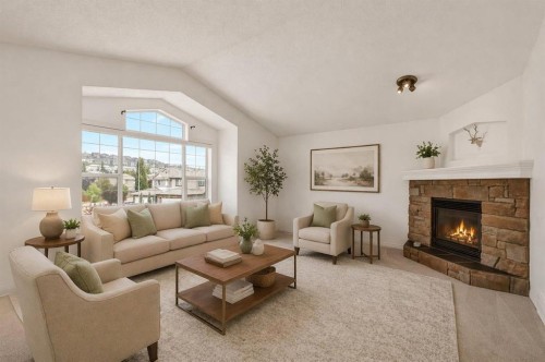 331 Springbank Place Sw, Calgary, AB - Indoor Photo Showing Living Room With Fireplace