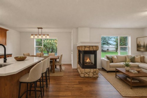 331 Springbank Place Sw, Calgary, AB - Indoor Photo Showing Living Room With Fireplace