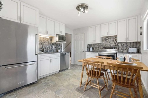 9852 Athens Road Se, Calgary, AB - Indoor Photo Showing Kitchen With Stainless Steel Kitchen