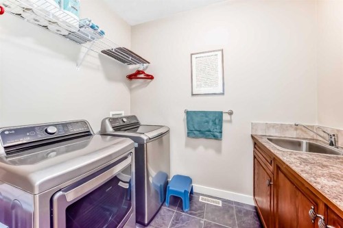 487 Rocky Ridge Drive Nw, Calgary, AB - Indoor Photo Showing Laundry Room