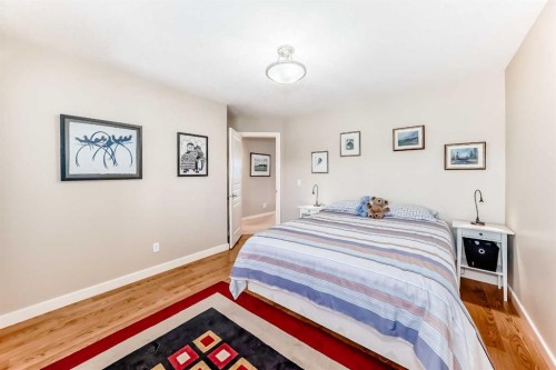 487 Rocky Ridge Drive Nw, Calgary, AB - Indoor Photo Showing Bedroom