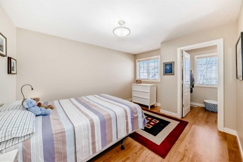 487 Rocky Ridge Drive Nw, Calgary, AB - Indoor Photo Showing Bedroom