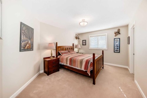 487 Rocky Ridge Drive Nw, Calgary, AB - Indoor Photo Showing Bedroom