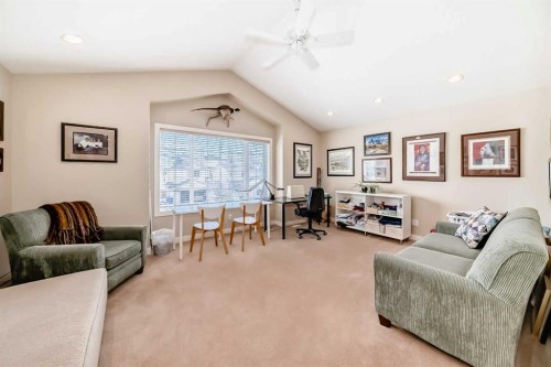 487 Rocky Ridge Drive Nw, Calgary, AB - Indoor Photo Showing Living Room