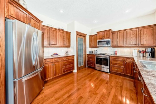 487 Rocky Ridge Drive Nw, Calgary, AB - Indoor Photo Showing Kitchen With Stainless Steel Kitchen