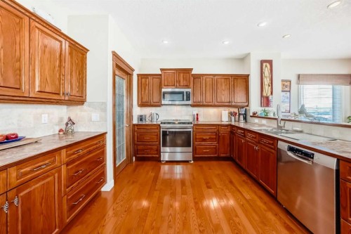 487 Rocky Ridge Drive Nw, Calgary, AB - Indoor Photo Showing Kitchen With Stainless Steel Kitchen